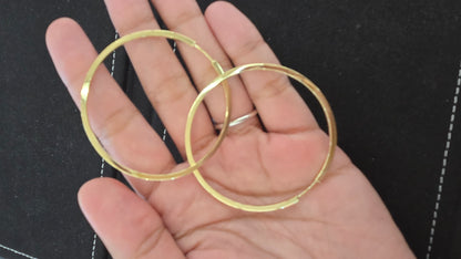 14k Square-edge hoop earrings combine a modern geometric silhouette with classic everyday wear, making them a chic and versatile gift option
