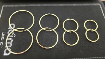 14k Square-edge hoop earrings combine a modern geometric silhouette with classic everyday wear, making them a chic and versatile gift option